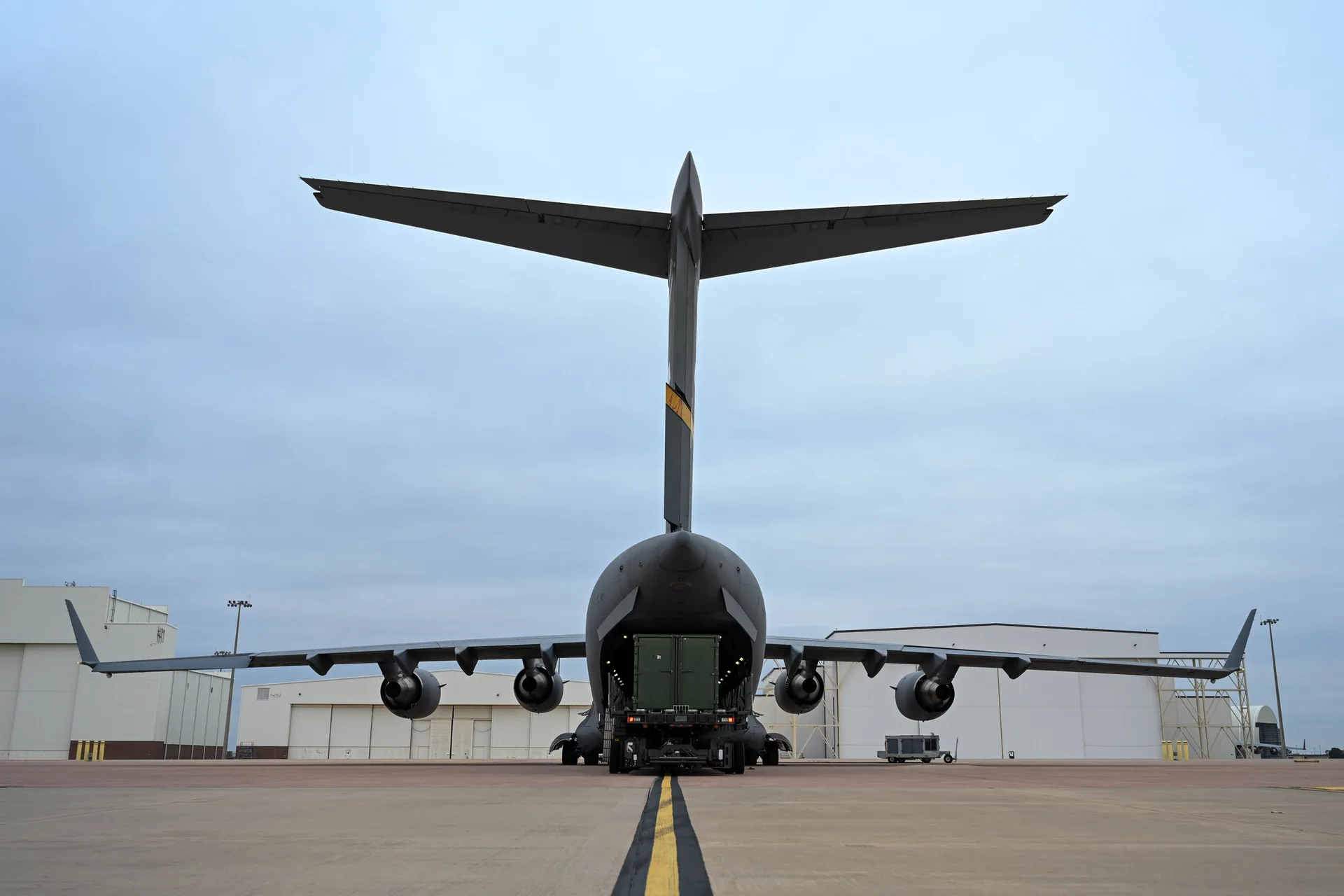 Cargo loading at the rear ramp of a C-17 aircraft